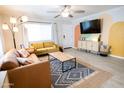 Cozy living room with stylish decor, comfortable seating, and a modern entertainment center at 1513 E Sheridan St, Phoenix, AZ 85006