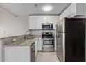 Well-equipped kitchen featuring granite countertops and stainless steel appliances at 2301 E University Dr # 172, Mesa, AZ 85213