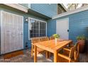 Cozy outdoor patio area with dining table and ample space for entertaining at 2301 E University Dr # 172, Mesa, AZ 85213