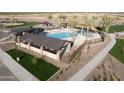 Community pool featuring a covered seating area and a splash pad for  at 3758 E Gold Mountain Ave, San Tan Valley, AZ 85143