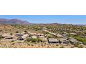 Gorgeous community featuring desert landscaping, beautiful homes, and scenic mountain views at 4562 S Alamos Way, Gold Canyon, AZ 85118
