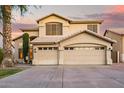 Elegant two-story home featuring a spacious three-car garage and meticulously maintained landscaping at 521 N Cambridge St, Gilbert, AZ 85233