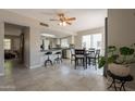 Open dining area adjacent to the kitchen, featuring tiled floors and natural light at 2455 E Broadway Rd # 115, Mesa, AZ 85204