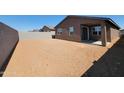 Expansive backyard with fresh dirt, awaiting personalized landscaping and outdoor enjoyment at 3529 E Audrey Dr, San Tan Valley, AZ 85143
