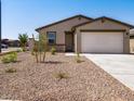 Inviting single-story house with a two-car garage and low-maintenance desert landscaping at 3557 E Audrey Dr, San Tan Valley, AZ 85143
