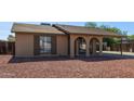 Single-story home featuring a carport and low-maintenance desert rock front yard at 4624 S Fair Ln, Tempe, AZ 85282