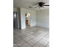 Living room view into kitchen, showcasing tile flooring at 527 S Macdonald --, Mesa, AZ 85210