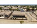 Home with covered patio, lush desert landscaping and fencing for privacy in a well-planned community at 6811 S Four Peaks Way, Chandler, AZ 85249