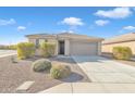 Charming single-story home boasting a well-kept yard and a welcoming facade at 7580 W Darrel Rd, Laveen, AZ 85339