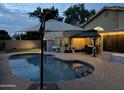 Backyard pool and patio featuring an outdoor dining area and gazebo at 9004 S Ash Ave, Tempe, AZ 85284