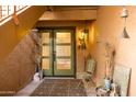 Inviting front entrance featuring double doors, stylish decor, and a cozy, welcoming atmosphere at 16233 E Rosetta Dr # 47, Fountain Hills, AZ 85268