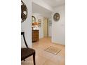 Hallway with tiled flooring, stylish decor, and an inviting passage to the rest of the home at 16233 E Rosetta Dr # 47, Fountain Hills, AZ 85268
