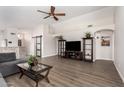 Spacious living room featuring wood floors, high ceilings, and natural light at 1653 E Gail Dr, Chandler, AZ 85225