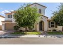 Beautiful two-story home with well-maintained front yard and attractive landscaping at 913 W Yosemite Dr, Chandler, AZ 85248