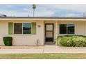 Inviting exterior showcasing well-kept lawn and charming front entrance of the home at 9265 N 111Th Ave, Sun City, AZ 85351