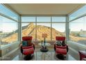 Bright, airy living space offers floor-to-ceiling windows with expansive mountain views at 140 E Rio Salado Pkwy # 1006, Tempe, AZ 85281