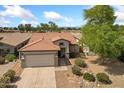 Exterior aerial view of a single-Gathering home with a two-car garage and desert landscaping at 21362 E Puesta Del Sol Rd, Queen Creek, AZ 85142