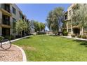 Lush community green space perfect for recreation and relaxation between townhomes at 4236 N 27Th St # 37, Phoenix, AZ 85016