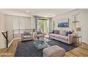 Inviting living room featuring stylish furniture, decor, and abundant natural light at 4236 N 27Th St # 37, Phoenix, AZ 85016