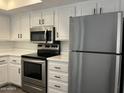 Functional kitchen featuring stainless steel appliances and ample cabinet space at 461 W Holmes Ave # 271, Mesa, AZ 85210