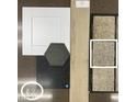 Selection of interior design materials including white cabinets, neutral carpet, and wood-style flooring at 17245 W Corrine Dr, Surprise, AZ 85388