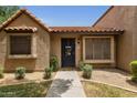 Inviting home entrance featuring a decorative welcome sign and tidy landscaping at 3491 N Arizona Ave # 118, Chandler, AZ 85225