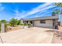 Charming single story home featuring beautiful landscaping and a spacious front yard, with a large driveway at 4028 W El Camino Dr, Phoenix, AZ 85051