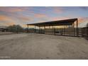 Fenced horse corral with overhead shelter at 30511 N 162Nd Way, Scottsdale, AZ 85262