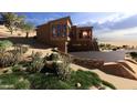 Contemporary desert home with stone and stucco, showcasing a modern design and natural surroundings at 3545 N Vista Way # 404, Buckeye, AZ 85396
