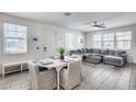 Inviting living area featuring neutral color palettes, comfortable seating, and lots of natural light at 651 N Bay Dr, Gilbert, AZ 85233