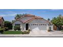 Well-maintained single-Gathering home with desert landscaping, a two-car garage, and a classic Southwestern design at 6732 W Sack Dr, Glendale, AZ 85308