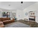 Open-concept living area with a comfortable sofa, modern decor, and seamless flow into the adjacent bedroom at 1320 E Scott Ave, Gilbert, AZ 85234