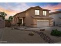 Charming two-story home with a well-manicured front yard with drought resistant landscaping and a two car garage at 4323 E Dublin St, Gilbert, AZ 85295