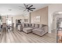 Spacious living room with an open floor plan, modern decor, and lots of natural light at 5526 W Ellis Dr, Laveen, AZ 85339