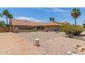 Lovely single story home featuring desert landscaping, a beautiful clay roof, and charming desert style color scheme at 6073 E Beck Ln, Scottsdale, AZ 85254