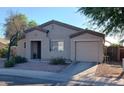 Charming single-story home featuring a low maintenance yard and attached garage at 7118 S 37Th Gln, Phoenix, AZ 85041