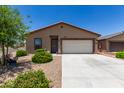 A well-maintained single-Gathering home with a two-car garage and desert landscaping is a great curb appeal at 8012 S Magic Dr, Casa Grande, AZ 85193