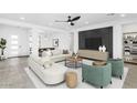 Bright, open living room with modern furnishings and plenty of natural light at 812 E Summerside Rd, Phoenix, AZ 85042