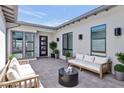 Comfortable outdoor patio featuring stylish seating and sleek modern design at 812 E Summerside Rd, Phoenix, AZ 85042