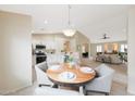 Inviting dining area open to the kitchen and living room, perfect for gatherings at 2627 E Gary Way, Phoenix, AZ 85042