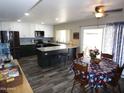 Well-appointed kitchen featuring two-tone cabinetry, modern appliances, and granite countertops at 3726 W Campo Bello Dr, Glendale, AZ 85308