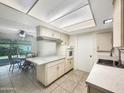 Bright kitchen with an eat-in breakfast area and stainless steel sink at 4533 W Cavalier Dr, Glendale, AZ 85301