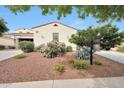 Well-maintained single-story home with desert landscaping and inviting curb appeal at 3521 N Hooper St, Buckeye, AZ 85396