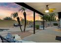 Relaxing covered patio overlooking the pool area, perfect for outdoor entertaining and lounging at 4329 W Electra Ln, Glendale, AZ 85310