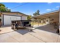 Large garage and an expansive covered area perfect for storage or outdoor projects at 439 N Cherry --, Mesa, AZ 85201