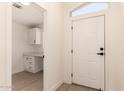 Bright entryway with a built-in desk area and natural light, adding functionality at 8500 E Southern Ave # 550, Mesa, AZ 85209