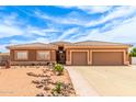 Lovely single-story home showcases a tile roof, three-car garage, and minimal landscaping at 10535 W San Miguel Ave, Glendale, AZ 85307