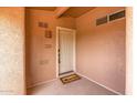 Entry way featuring a 'Welcome Home' door mat in front of the unit's front door at 11500 E Cochise Dr # 2001, Scottsdale, AZ 85259