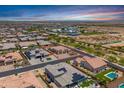 Aerial view of home's location within a vibrant community; highlighting neighborhood layout and nearby amenities at 12516 W Mclellan Ct, Glendale, AZ 85307