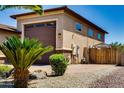 Lovely single-story home features a private garage and low maintenance desert landscaping at 16141 N 183Rd Dr, Surprise, AZ 85388